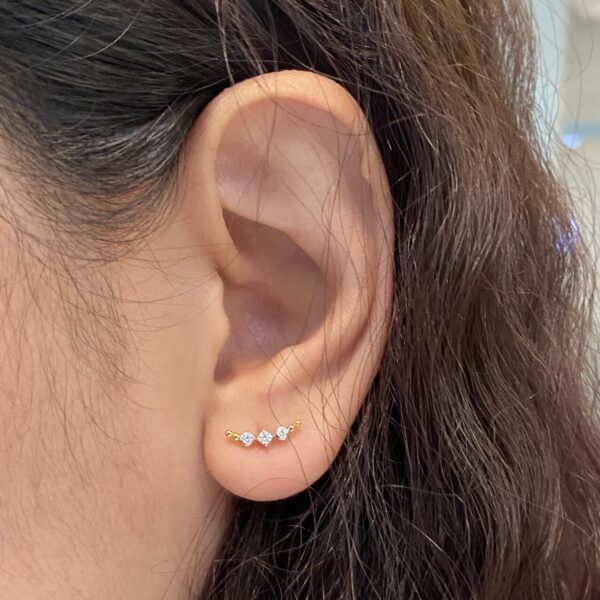 Curved beaded adorn