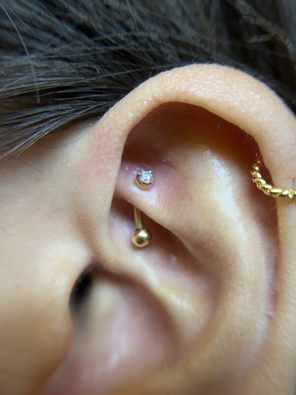 Round brilliant rook barbell